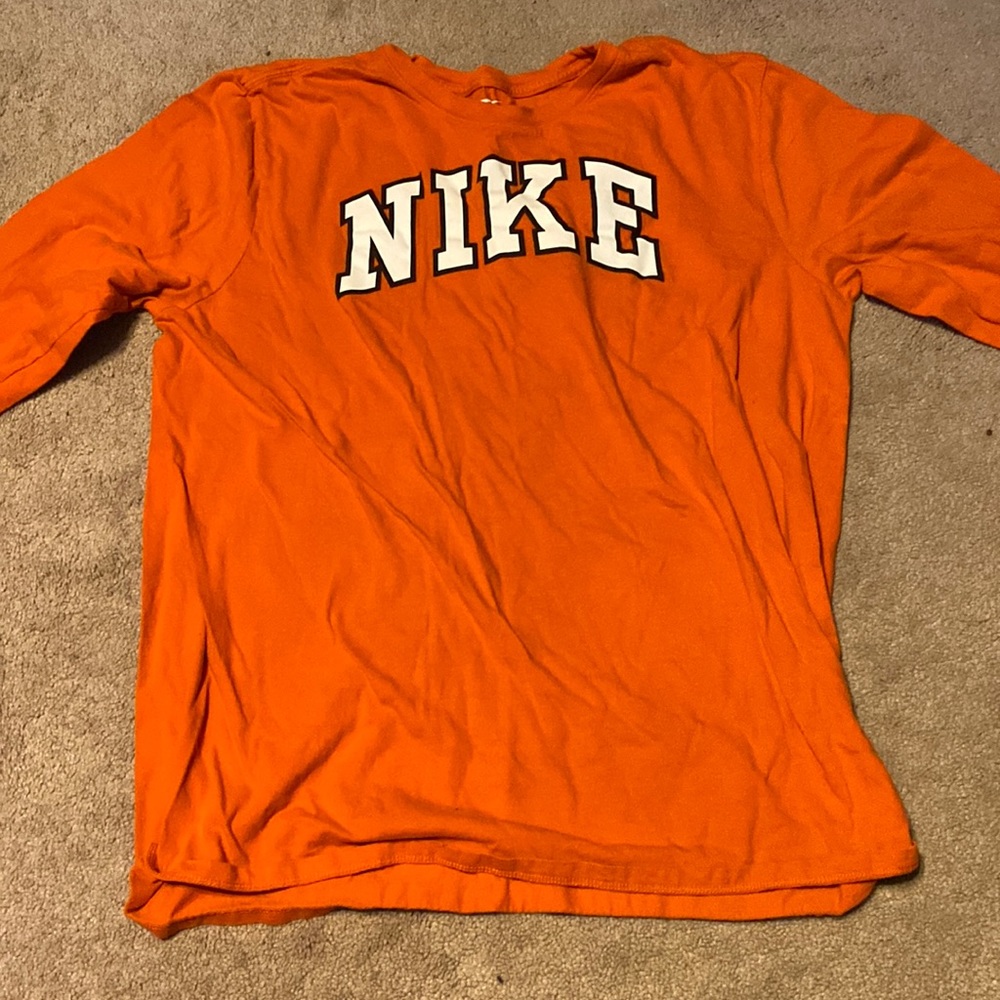 Orange Nike shirt